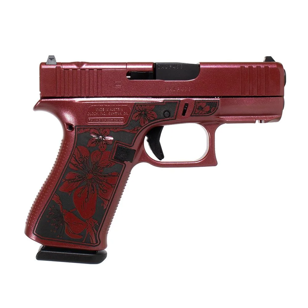 Glock 43x MOS Cherry Blossom engraved Medusa pink frame subcompact 9mm pistol side view